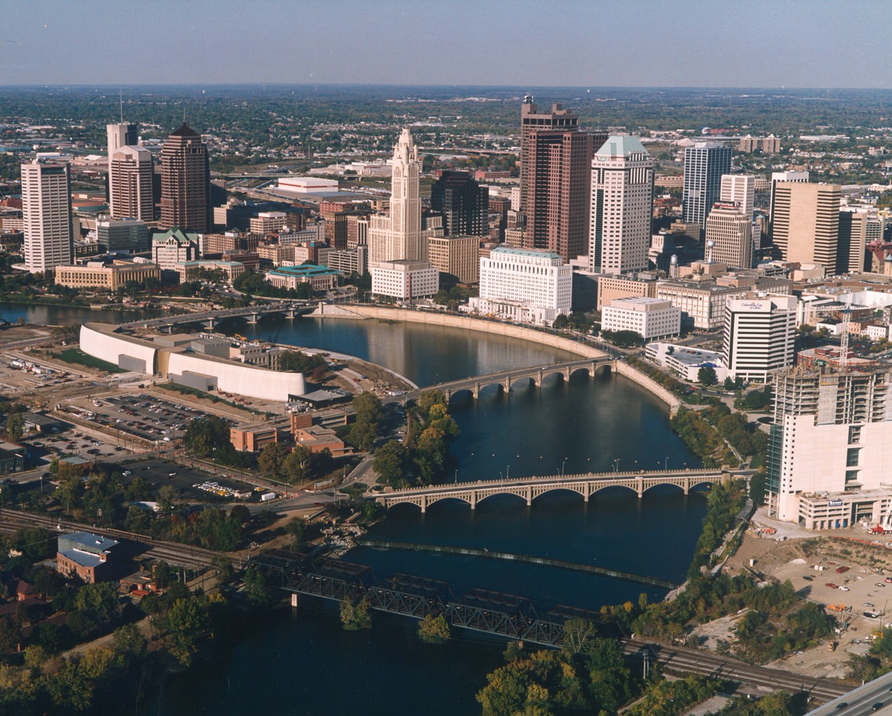 Aerial view of the downtown Columbus riverfront, with COSI under construction, 1998 or 1999.