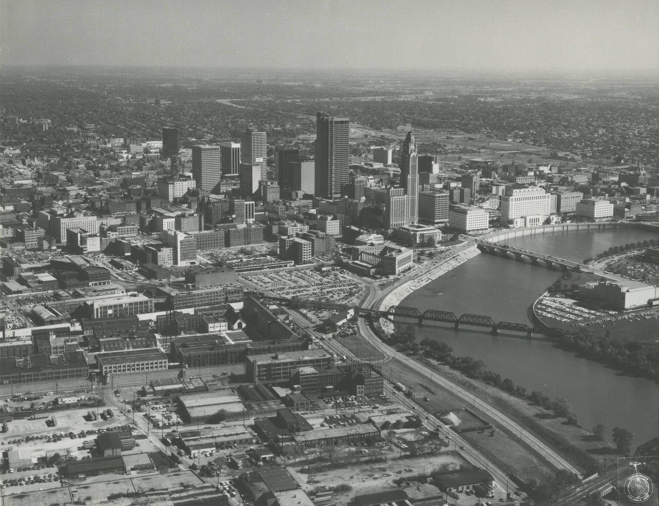 Aerial view of downtown Columbus looking southeast, featuring the Belmont Casket and Ohio Penitentiary, 1973.