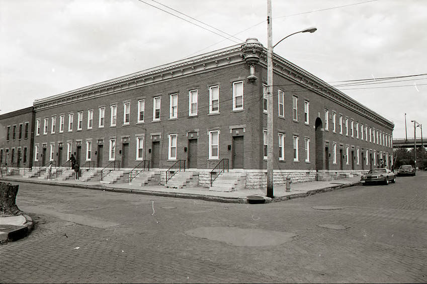 C. M. Williams Building, at the corner of Kerr and Russell Streets in Italian Village, built ca. 1890, one of the first apartments with separate street entrances for each unit, L-shaped brick construction with decorative cornice work. Circa 1970s