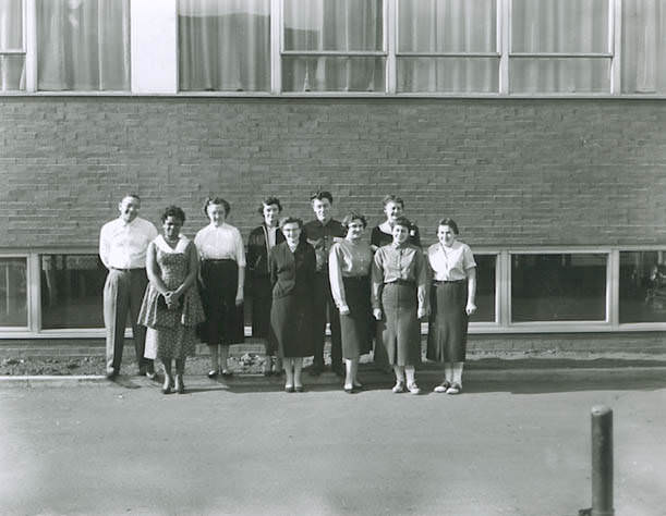 Columbus Metropolitan Library staff photographed outside the Main Library, December 1955.