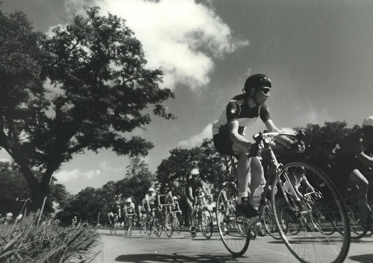 Participants in the Tour de Houston bicycle race take a scenic ride, Houston, Texas.