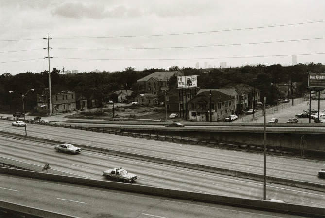 Automobiles on Houston freeway, 1980s