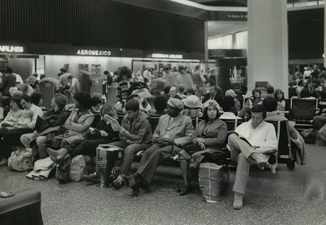 Travelers wait for flights at Houston Intercontinental Airport, Houston, Texas.