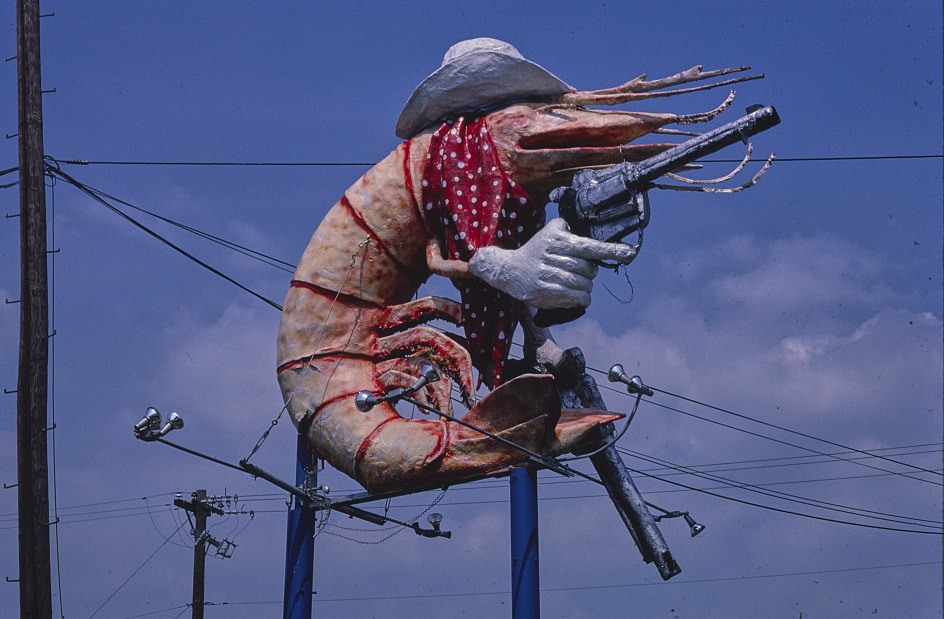 Christie's Restaurant sign featuring cowboy shrimp in Houston, Texas, 1983