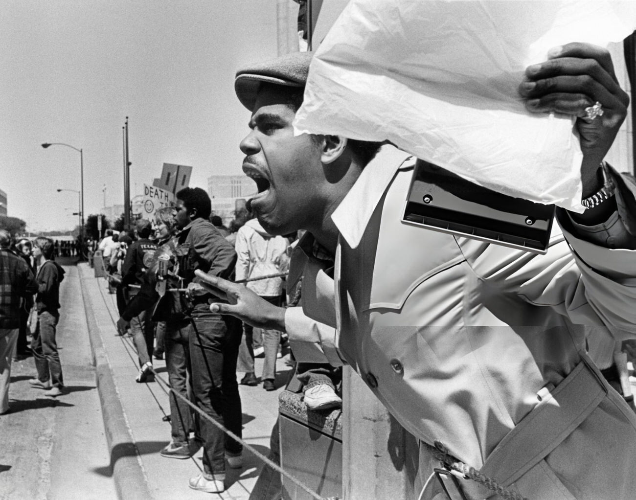 Protesters and police during a Ku Klux Klan march in downtown Houston, Texas, 1983.