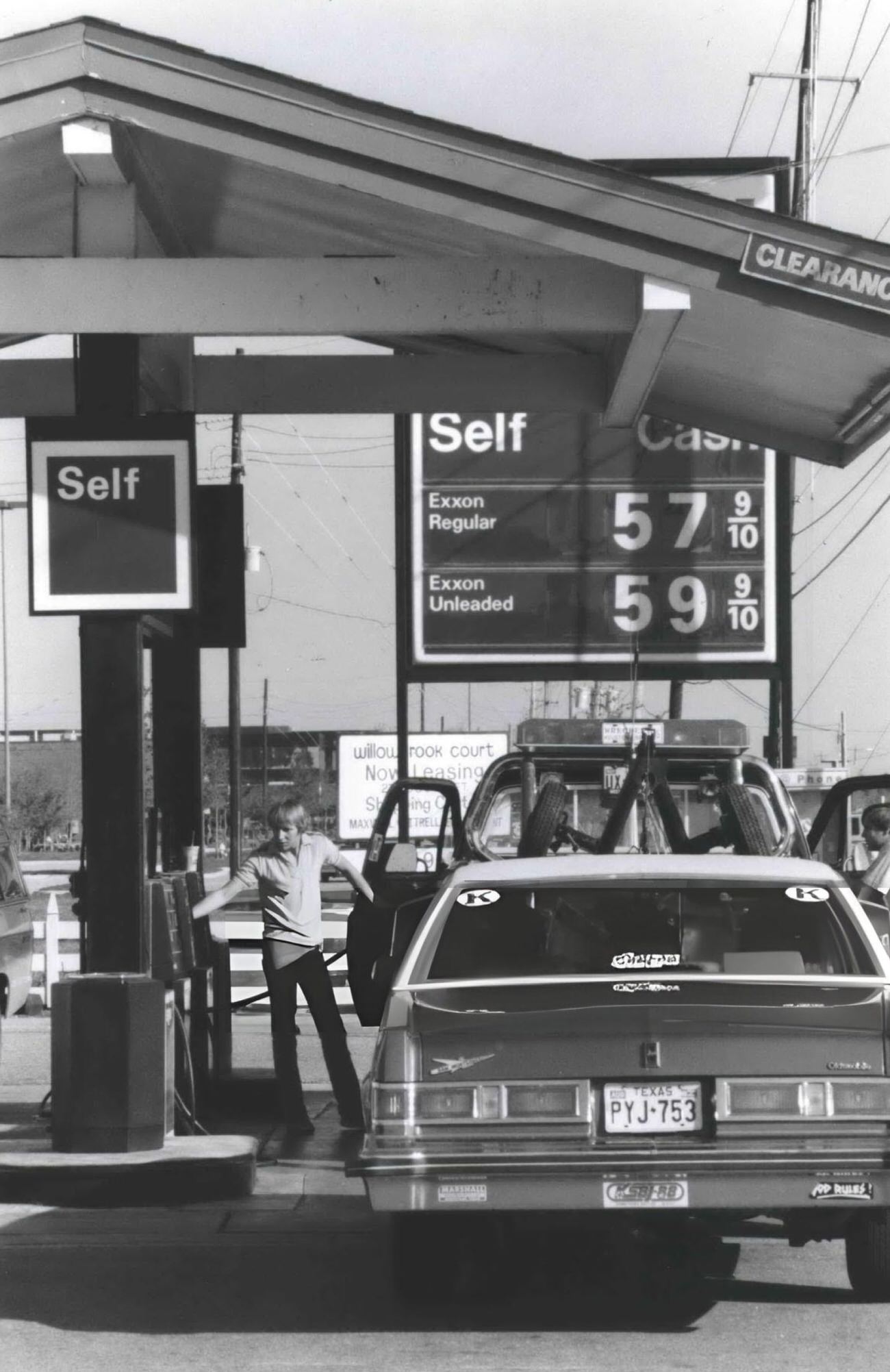 Low gasoline prices at an Exxon station at Hwy 149 and 1960, Houston, Texas, 1980s