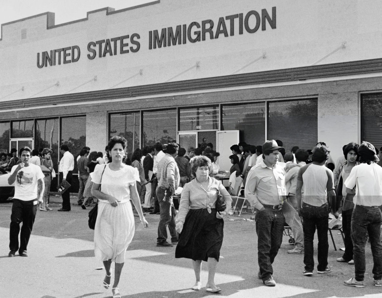 Undocumented individuals line up at the U.S. Immigration and Naturalization Service office before the amnesty period ends, Houston, Texas, May 1, 1988.