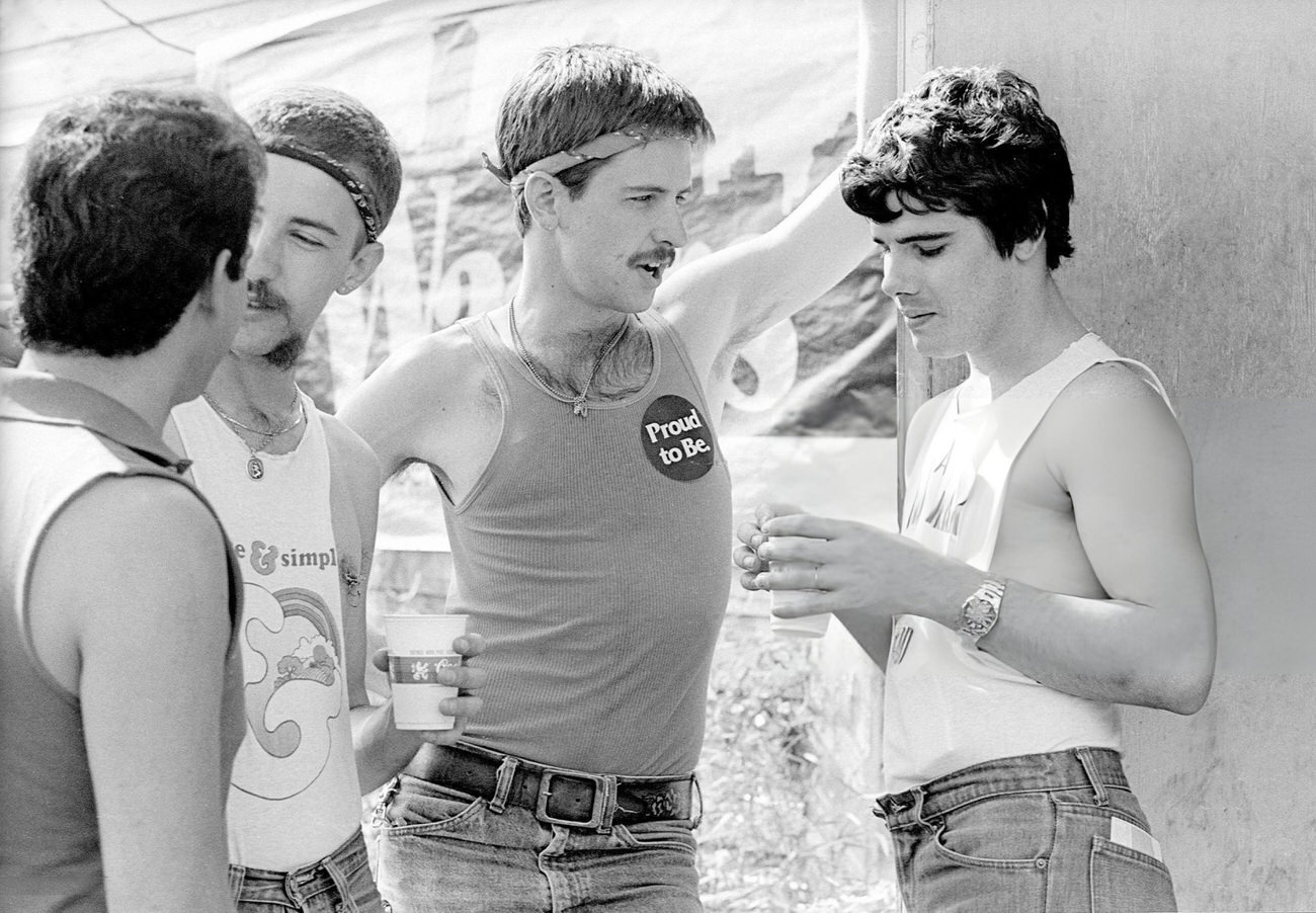 Four young men outside Mary, a popular hangout in Montrose, Houston, Texas, 1981.