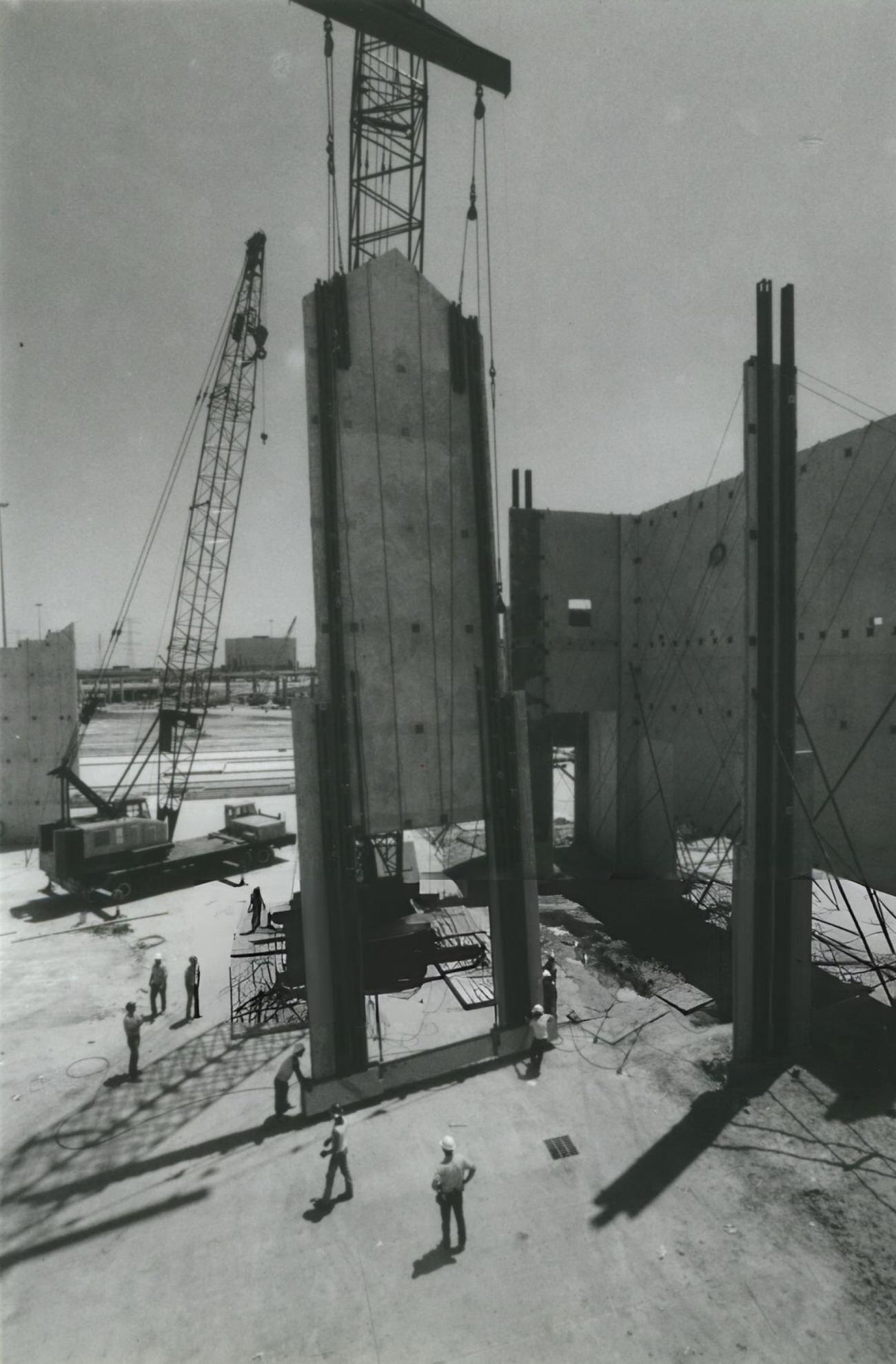 A crane lifts a wall panel for the Commons at Greenspoint shopping center, under construction at Interstate 45 North and Beltway 8, Houston, Texas.