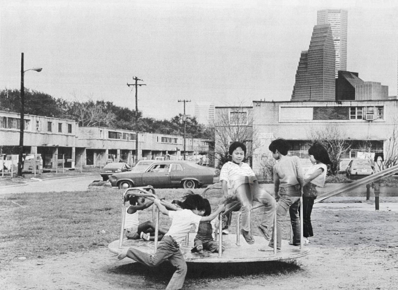 Vietnamese children play at the Allen Harway apartments on the edge of downtown Houston, Texas, March 18, 1985.