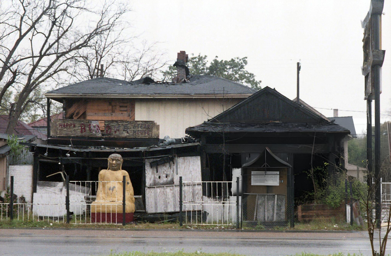 The Happy Buddha restaurant at 516 Westheimer, site of frequent fires, set for demolition, Houston, Texas, March 16, 1987.