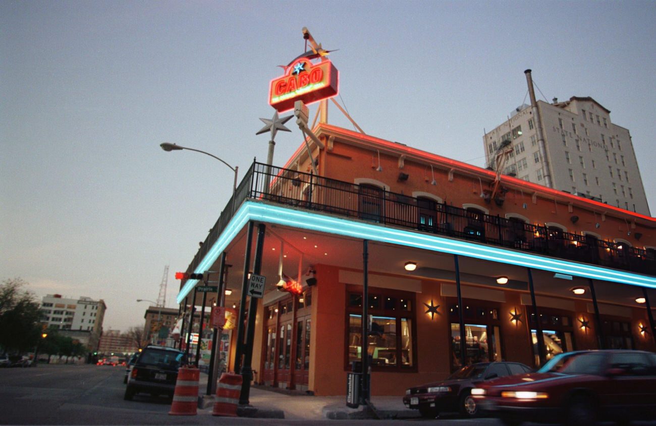 The opening of Cabo, The Original Mix-Mex Grill, in downtown Houston on April 1, 1998, highlights the city's expanding culinary scene and nightlife, offering a vibrant dining experience, Texas.