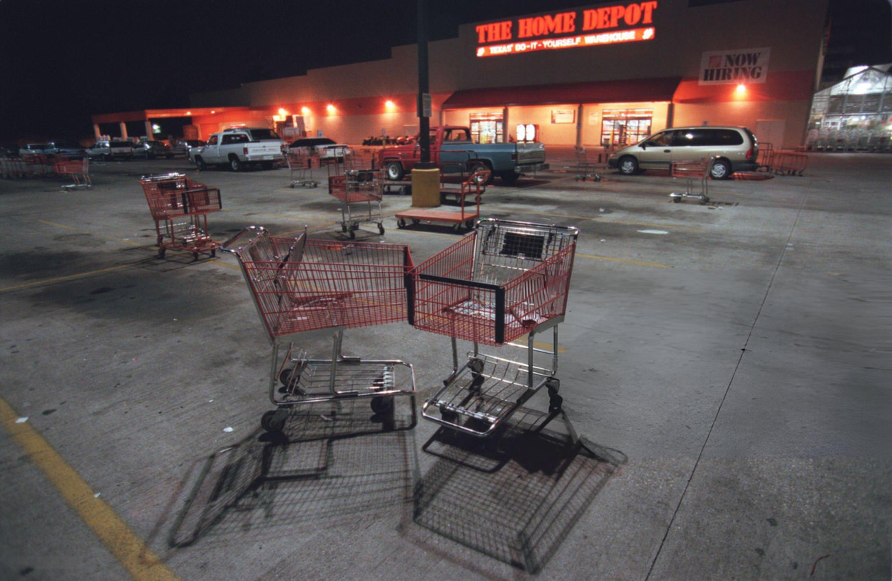 Mostly empty parking lot at a 24-hour Home Depot, Houston, Texas, 1999.