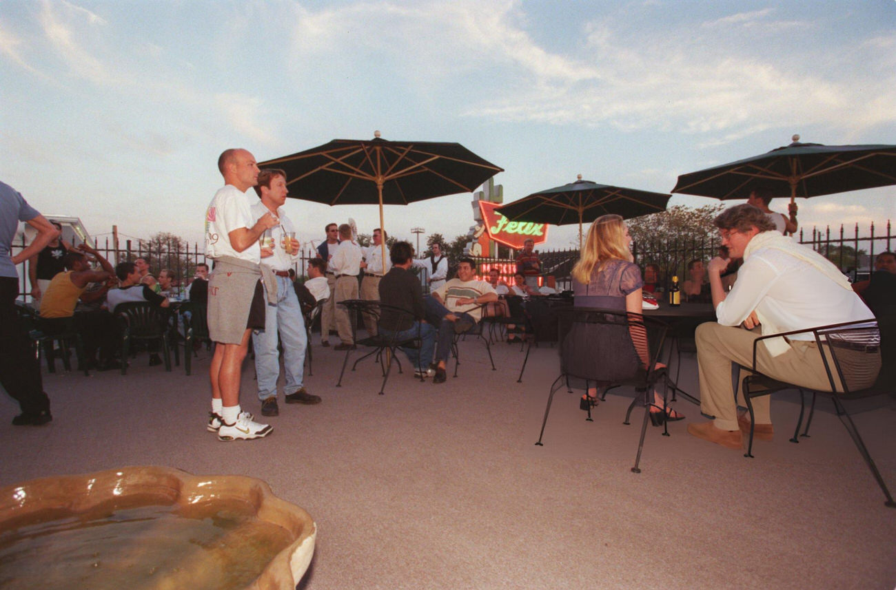 Houstonians enjoy fall weather at Prive Club with a rooftop overlooking Westheimer and Montrose, Houston, Texas, 1999.