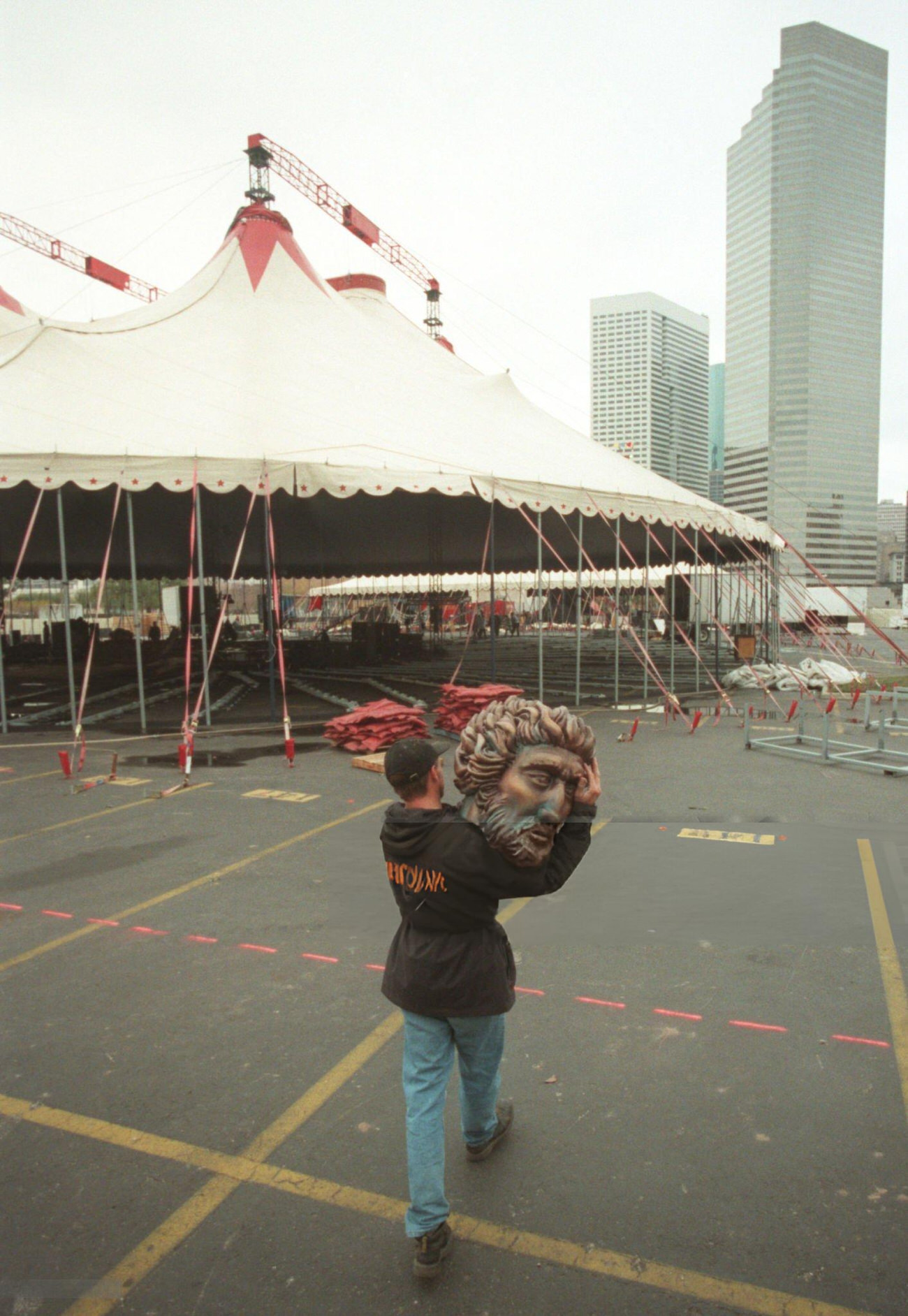 Barnum's Kaleidoscape's ring boss prepares for the circus under a tent downtown, Houston, Texas, 1999.