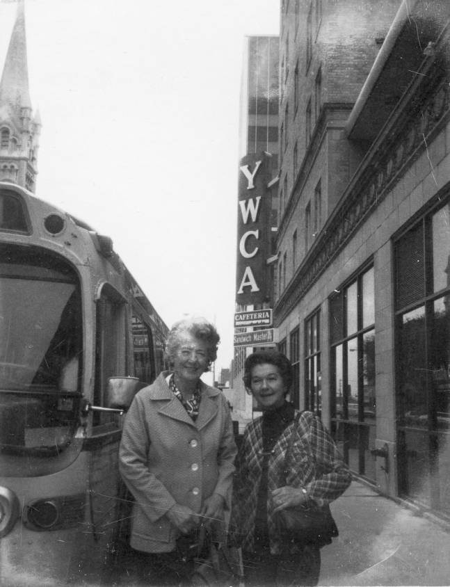Two women in front of a YWCA building, 1960s