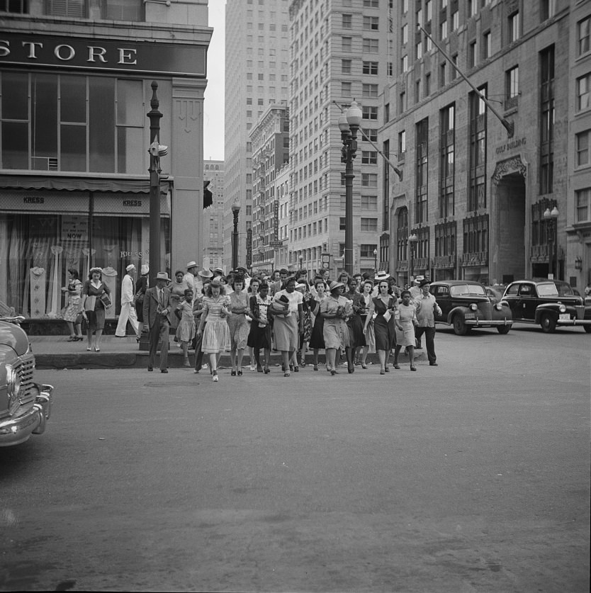People crossing a downtown street with the green light in Houston, Texas, 1943