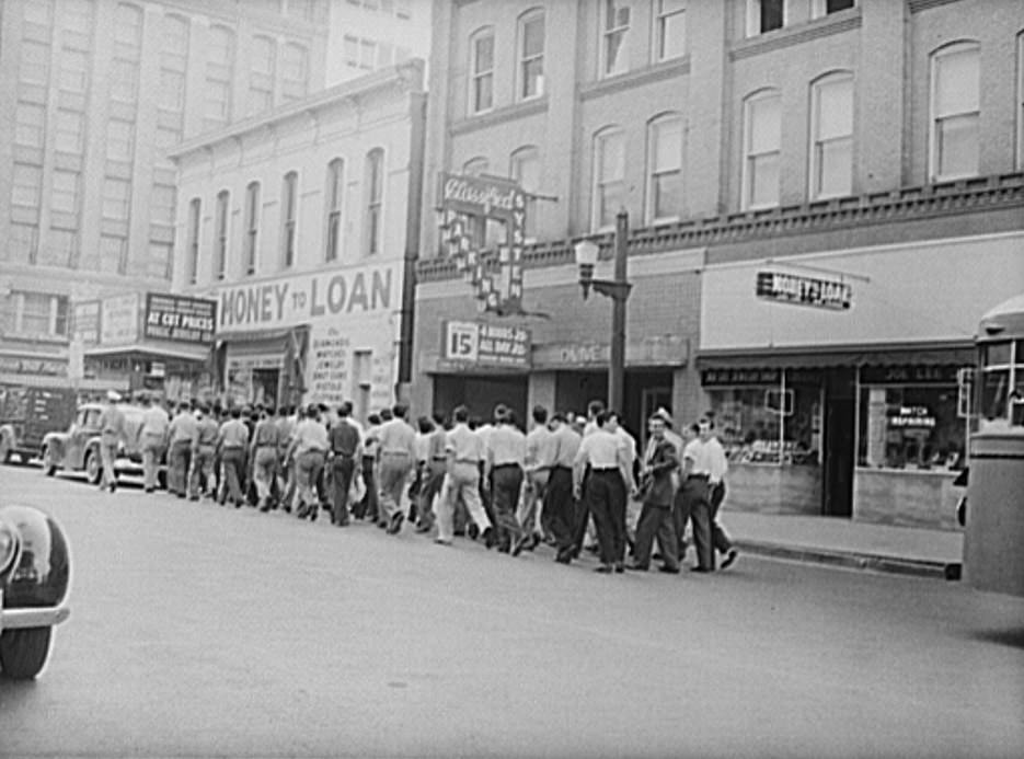 Inducted men marching to the reception center in Houston, Texas, 1943