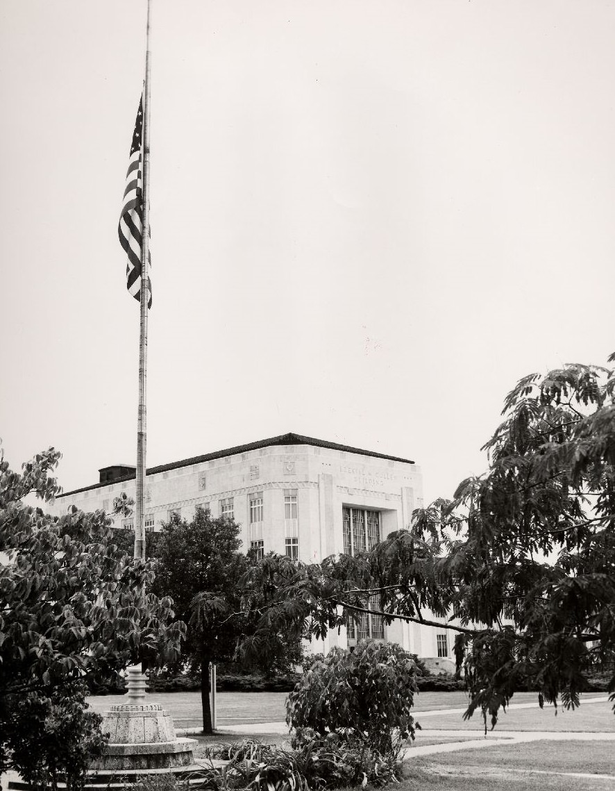 American flag at half-staff at Ezekiel Cullen Building, 1957