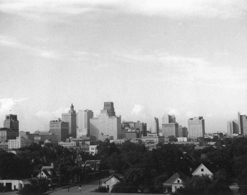 Downtown Houston skyline and nearby houses, 1950s