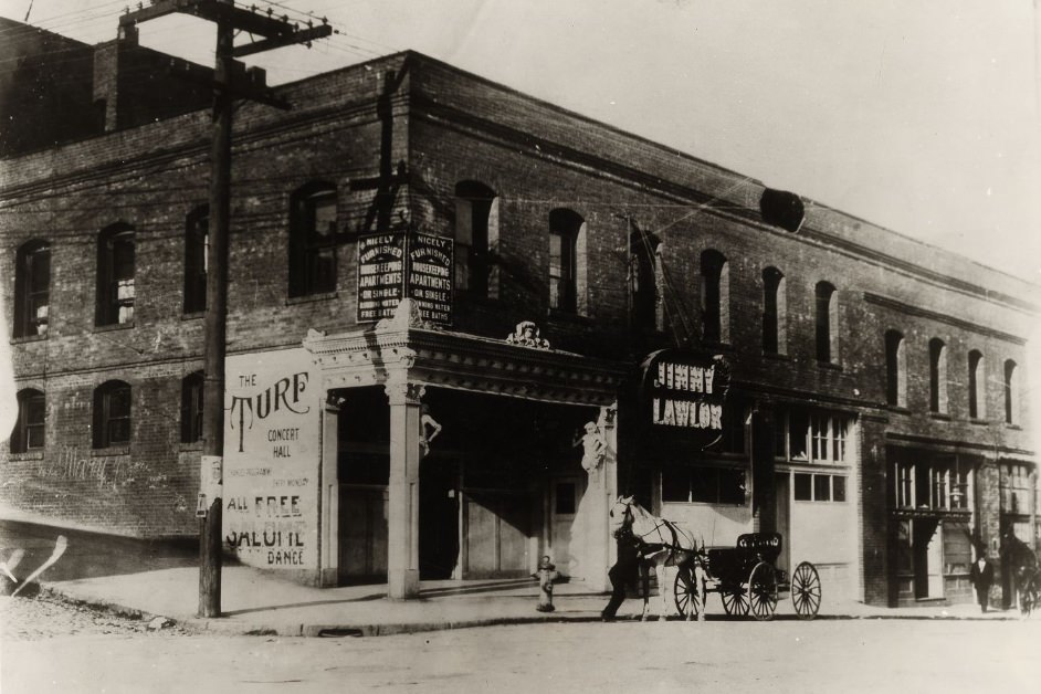 The Turf concert hall on the corner of Montgomery and Pacific streets in the Barbary Coast district, early 20th century.