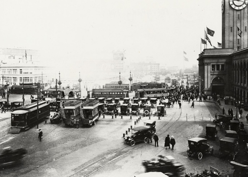 Vehicles parked in front of the Ferry Building in the 1910s.