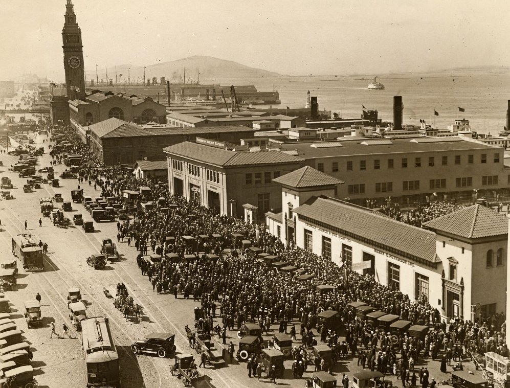 Crowd of people on the Embarcadero, near the Ferry Building in 1924.