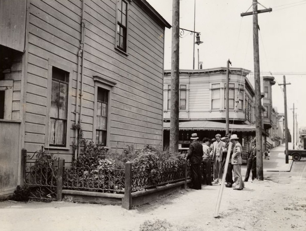 Agents inspecting marijuana plants in front of Rinaldo Gotti's home in the Mission District, 1935