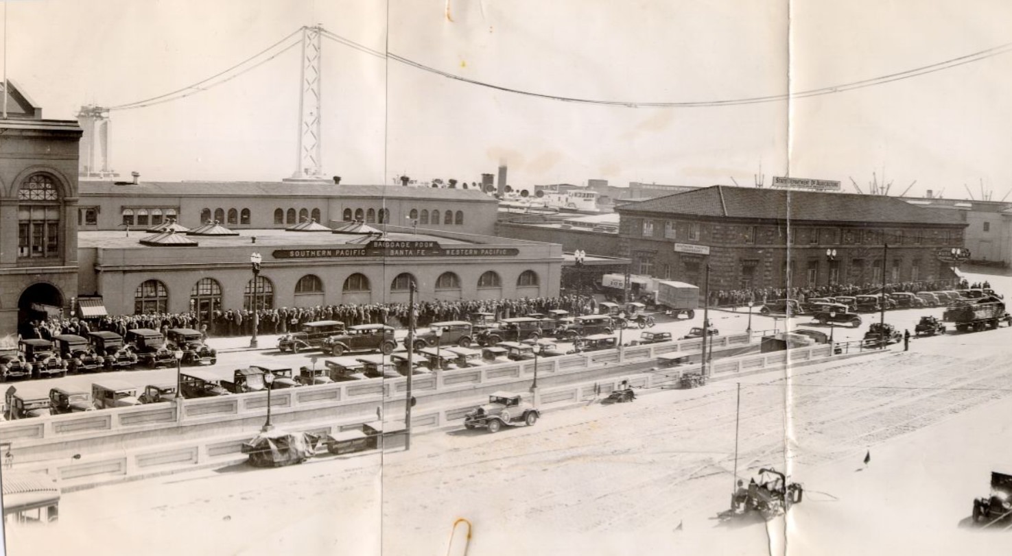Crowds of people lined up along the Embarcadero in the 1930s