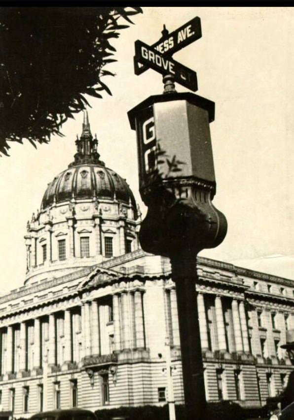 Intersection of Van Ness Avenue and Grove Street with City Hall in the background, 1937