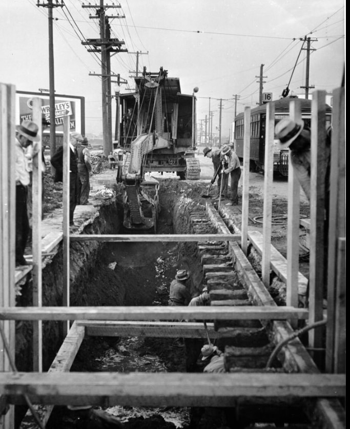 Laborers working on the excavation for Third Street sewer near Isthmus Creek Bridge, 1935