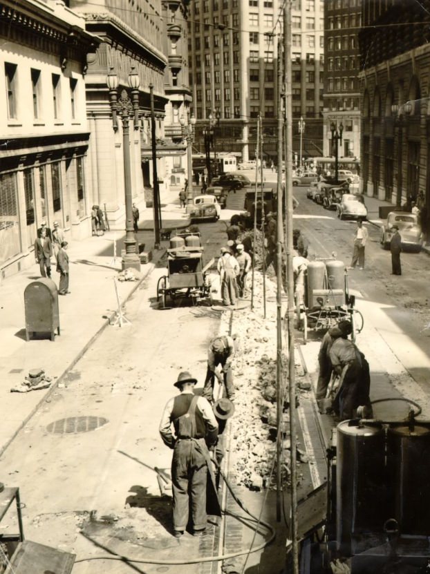 Market Street Railway crew removing long-unused tracks, 1940