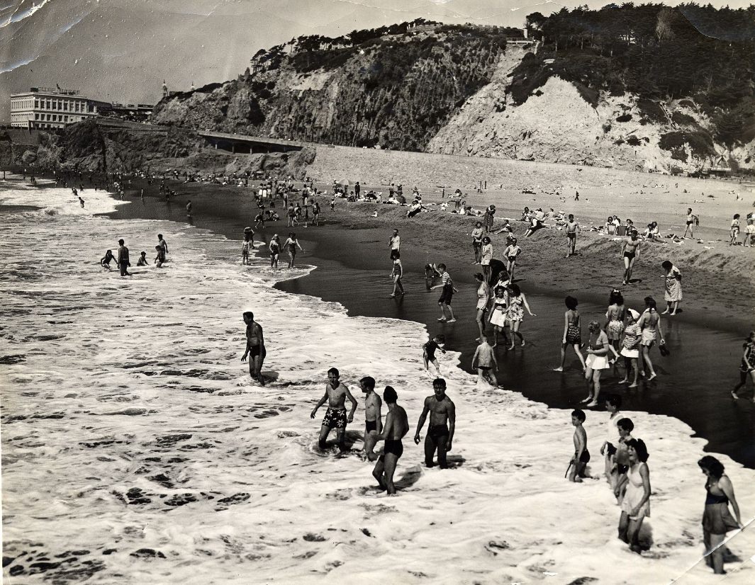 People wading in the surf at Ocean Beach, 1943