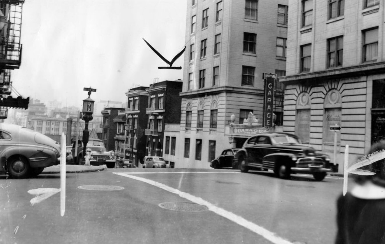 Car going through stop sign on Bush and Hyde Street, 1944