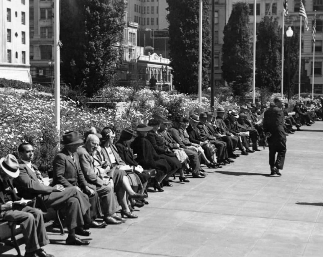 Benches lined with people in Union Square, 1942