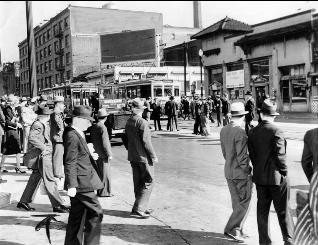 Commuters leaving the Southern Pacific Depot at Third and Townsend streets, 1940