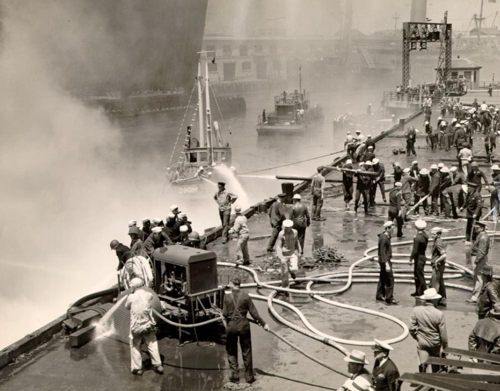 Coast Guard fighting a fire at the San Francisco waterfront, 1944