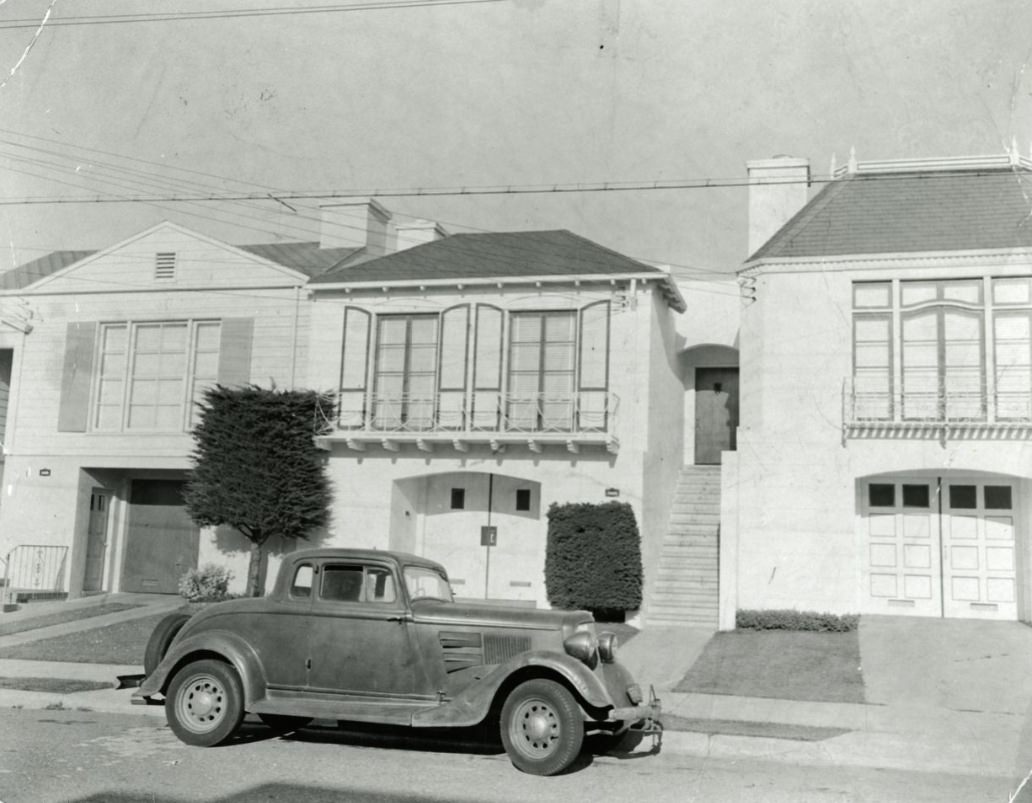 Eleanor's father's car in front of their house, 1950