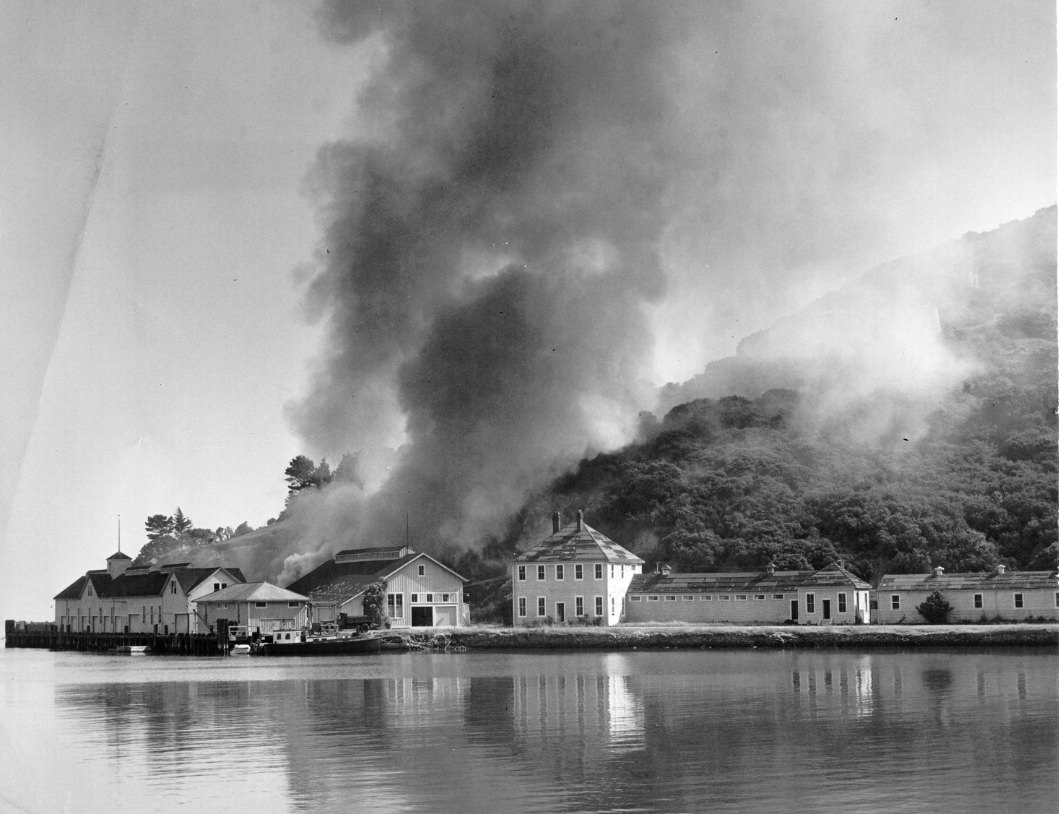 Intentional fire destroying buildings on Angel Island, 1940s