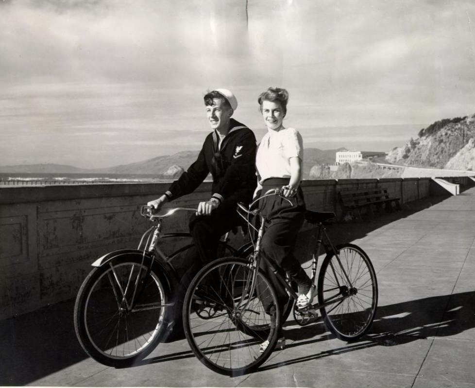 Audrey Berman and companion bicycling at Ocean Beach, 1942