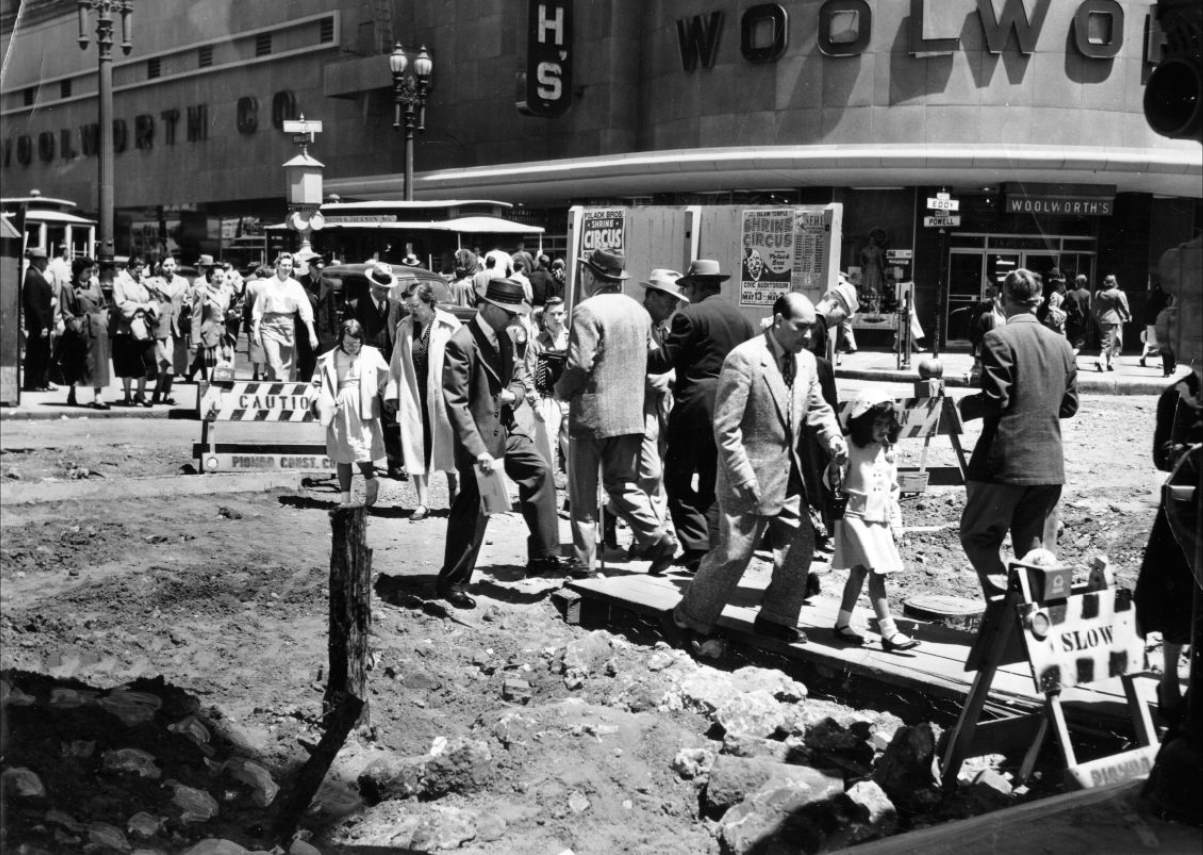 Pedestrians on a temporary walkway at Powell and Eddy Street, 1953.