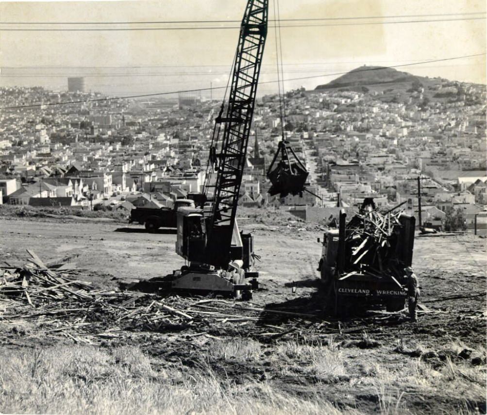 Wrecking company operations in Diamond Heights, 1957.