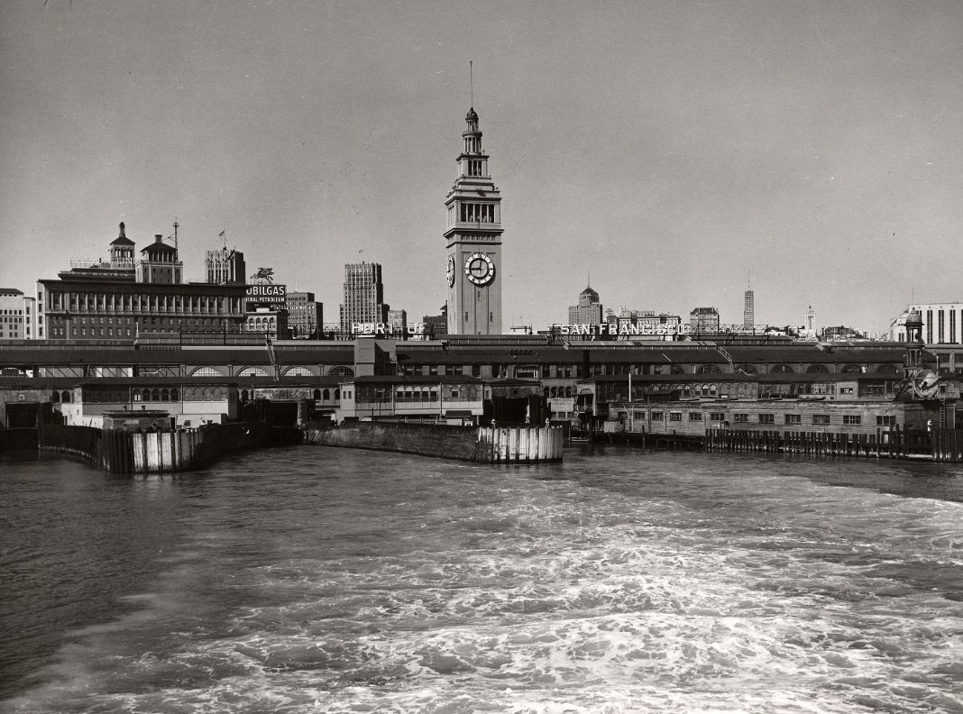 View of Ferry Building from a ferry on the bay, circa 1950s.