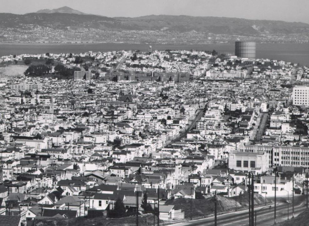 View over Mission and Potrero district from upper Market St. with Mt. Diablo in distance, circa 1957.