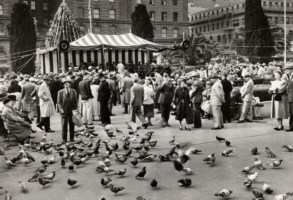 People gather in Union Square to listen to the Golden Gate Park band, 1953.