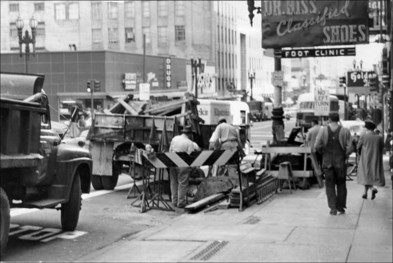 PG&E workers block a pedestrian crosswalk at Sutter and Powell Streets, 1955.