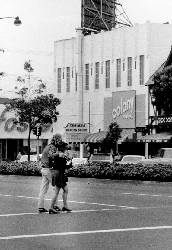 Two crossing Geary Boulevard in the Richmond District, 1969.