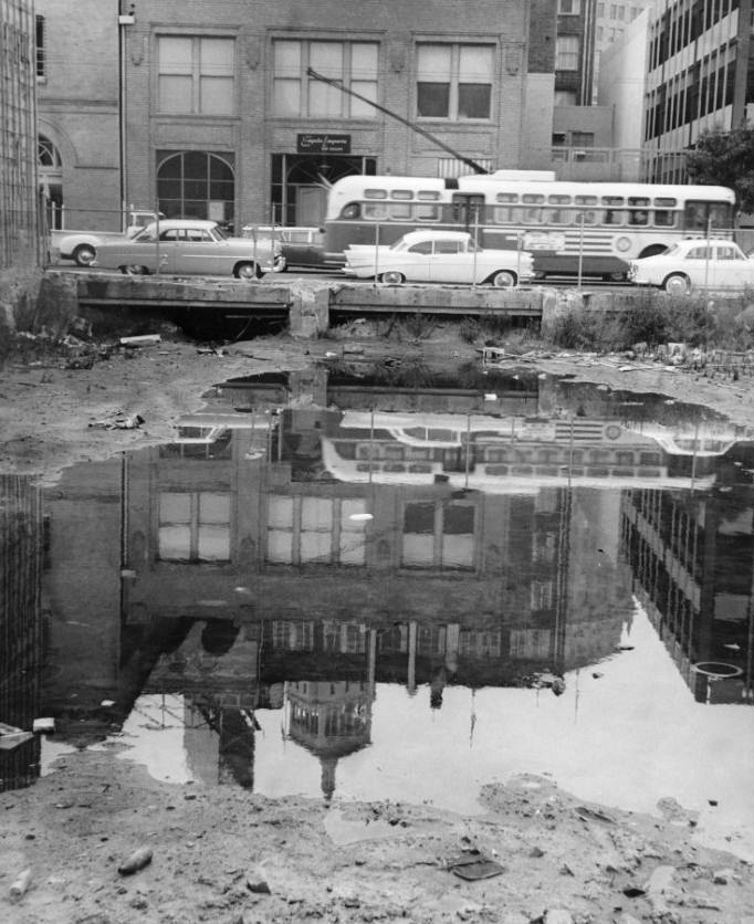 Pool of water in a vacant lot on Sacramento and Drumm Street, 1963.