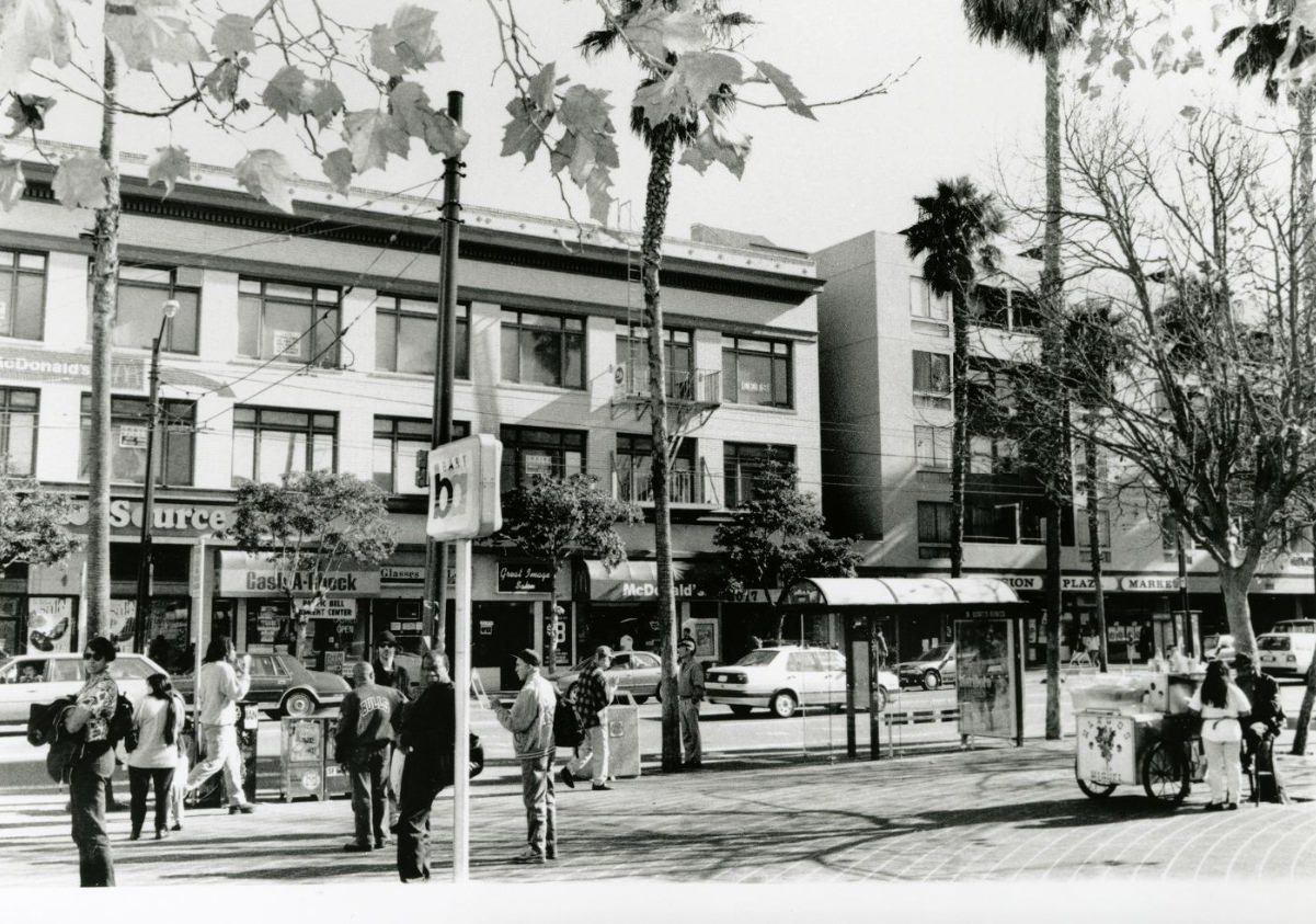 Businesses and people on 16th and Mission Streets, 1983