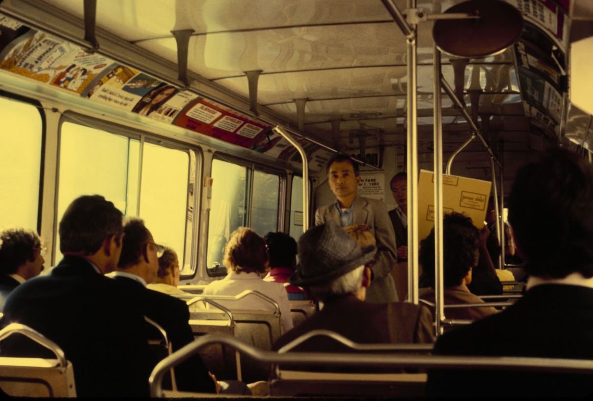 People boarding a Muni bus, 1984.